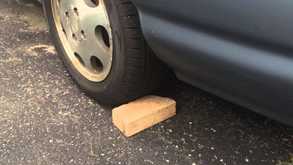CMH mazda Menlyn- Brick under a tyre